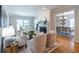Spacious living room with fireplace, hardwood floors, and open access to dining area at 333 Mimosa Dr, Decatur, GA 30030