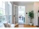 Bright living room featuring French doors leading to a cozy, decorated office space at 333 Mimosa Dr, Decatur, GA 30030