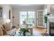 Bright living room with large windows, fireplace, and comfortable seating at 333 Mimosa Dr, Decatur, GA 30030