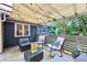 Relaxing covered deck with comfortable seating, perfect for enjoying the outdoors in style and comfort at 1222 Crestwood Se Dr, Atlanta, GA 30316
