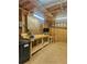 Well-organized garage featuring a workbench, pegboard, and electrical outlets for convenient tool use at 1222 Crestwood Se Dr, Atlanta, GA 30316