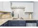 Modern kitchen with white subway tile backsplash, granite counters and stainless steel appliances at 1222 Crestwood Se Dr, Atlanta, GA 30316