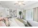 Spacious main bedroom boasting natural light, hardwood floors, and neutral decor at 1222 Crestwood Se Dr, Atlanta, GA 30316