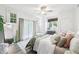 Bright main bedroom with hardwood floors, stylish décor and great natural light at 1222 Crestwood Se Dr, Atlanta, GA 30316