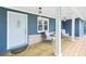 Inviting covered porch area with brick siding and outdoor seating at 1222 Crestwood Se Dr, Atlanta, GA 30316