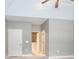 A bedroom with neutral walls and carpet and an ensuite bathroom at 1640 Arbor Green Nw Ct # 1102, Kennesaw, GA 30152