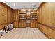 Versatile bonus room with custom wood paneling and built-in shelving, ideal for an office or library at 2849 Shiaway Trl, Snellville, GA 30039