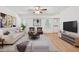 Inviting living room featuring modern furnishings, bright lighting, and stylish decor at 2849 Shiaway Trl, Snellville, GA 30039