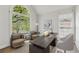 Bright home office featuring large window, desk, and comfortable seating at 2849 Shiaway Trl, Snellville, GA 30039
