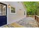The exterior shows a wooden deck and house siding surrounded by lush green trees at 3417 Glen Rd, Decatur, GA 30032