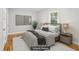Nicely staged bedroom featuring a large bed and plenty of natural light from the window at 3417 Glen Rd, Decatur, GA 30032