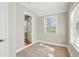 Bright bedroom featuring neutral paint, carpet flooring, and natural light from a window at 3417 Glen Rd, Decatur, GA 30032