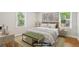 Nicely staged bedroom featuring two large windows, ample sunlight, and neutral tones at 3417 Glen Rd, Decatur, GA 30032