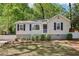 Charming home showcasing curb appeal, mature landscaping, and a well-maintained front yard at 3417 Glen Rd, Decatur, GA 30032