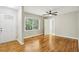 Inviting room featuring hardwood floors, natural light, and a welcoming front door at 3417 Glen Rd, Decatur, GA 30032