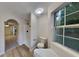 Bright bathroom showcasing a tiled shower, tub, and a window with natural light at 3640 Sapphire Ct, Decatur, GA 30034