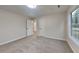 Bedroom featuring carpeted floor, neutral-colored walls, and windows at 3640 Sapphire Ct, Decatur, GA 30034