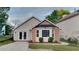 Charming single-story home featuring a bay window, brick accents, and a well-manicured lawn at 3640 Sapphire Ct, Decatur, GA 30034