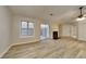 Bright living room with hardwood floors, fireplace, and sliding doors leading to the backyard at 3640 Sapphire Ct, Decatur, GA 30034