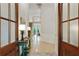 Grand foyer with high ceilings, hardwood floors, beautiful stairway, and elegant decor at 3803 Mill Creek Ct, Atlanta, GA 30341