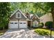 Charming home with a well-manicured lawn, two car garage and mature trees in a beautiful neighborhood at 3803 Mill Creek Ct, Atlanta, GA 30341