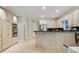 Kitchen features stainless steel appliances, ample cabinetry, granite countertops, and recessed lighting at 3803 Mill Creek Ct, Atlanta, GA 30341