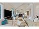Spacious living room featuring high ceilings, hardwood floors, fireplace and a view of the upper level at 3803 Mill Creek Ct, Atlanta, GA 30341