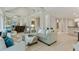 Open floor plan with light hardwood floors, neutral colored furniture and an open kitchen at 3803 Mill Creek Ct, Atlanta, GA 30341