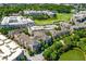 Aerial view showcasing the apartment complex, landscaping, and nearby golf course in a desirable location at 400 17Th Nw St # 1315, Atlanta, GA 30363