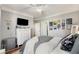 Comfortable bedroom with a TV, dresser, and stylish décor at 400 17Th Nw St # 1315, Atlanta, GA 30363