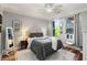Cozy bedroom with a plush rug, natural light, and neutral décor, creating a relaxing atmosphere at 400 17Th Nw St # 1315, Atlanta, GA 30363