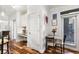 Dining area with hardwood floors, a small table, and a view of the kitchen and entrance at 400 17Th Nw St # 1315, Atlanta, GA 30363
