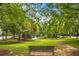 Tranquil common area with park benches and lush landscaping for relaxing at 400 17Th Nw St # 1315, Atlanta, GA 30363