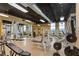 Spacious gym equipped with a variety of exercise machines, weights, and mirrors for a complete workout experience at 400 17Th Nw St # 1315, Atlanta, GA 30363
