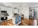 Well-lit kitchen boasts stainless appliances, sleek counters, and a decorative breakfast bar at 400 17Th Nw St # 1315, Atlanta, GA 30363