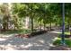 Scenic walkway with benches and lush greenery, perfect for leisurely strolls near the building at 400 17Th Nw St # 1315, Atlanta, GA 30363