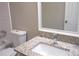 Bathroom featuring a shower-tub combination and a granite-topped vanity at 4018 Woodridge Way, Tucker, GA 30084