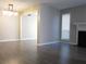Open floor plan from the living room view to another room featuring gray paint at 4018 Woodridge Way, Tucker, GA 30084