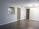 Open floor plan from the living room view to the kitchen featuring white cabinets at 4018 Woodridge Way, Tucker, GA 30084