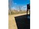 Spacious backyard with grass and a view of neighboring homes at 4685 Trefoil Path, Cumming, GA 30040