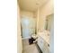 Bathroom with a single vanity, toilet, and sliding glass door shower at 4685 Trefoil Path, Cumming, GA 30040