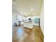 Bright kitchen featuring white cabinets, stainless steel appliances, and a center island at 4685 Trefoil Path, Cumming, GA 30040
