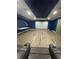Recreation Room showcasing a projector screen and modern design, perfect for movie nights at 4685 Trefoil Path, Cumming, GA 30040