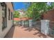 Private backyard with a wood deck and fence, enclosed by lush trees at 1751 Bergen Ct, Lawrenceville, GA 30043