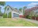 Well-maintained two-story home featuring a brick exterior, a two-car garage, and a beautifully landscaped lawn at 1751 Bergen Ct, Lawrenceville, GA 30043