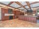 Bright kitchen with custom cabinetry, island, tiled floor, and high-end stainless steel appliances at 1751 Bergen Ct, Lawrenceville, GA 30043