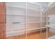 Walk-in pantry with custom shelving for ample storage at 1751 Bergen Ct, Lawrenceville, GA 30043