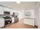 Well-equipped kitchen with stainless steel appliances and stylish backsplash at 4201 Regal Ridge Rd, Austell, GA 30106