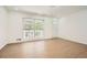 Inviting living room with a view of the front yard and a freshly painted door at 4201 Regal Ridge Rd, Austell, GA 30106