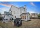 Large backyard with playground, play house, sunroom, and spacious lawn is ideal for outdoor activities at 524 Tackett Farms Rd, Smyrna, GA 30082